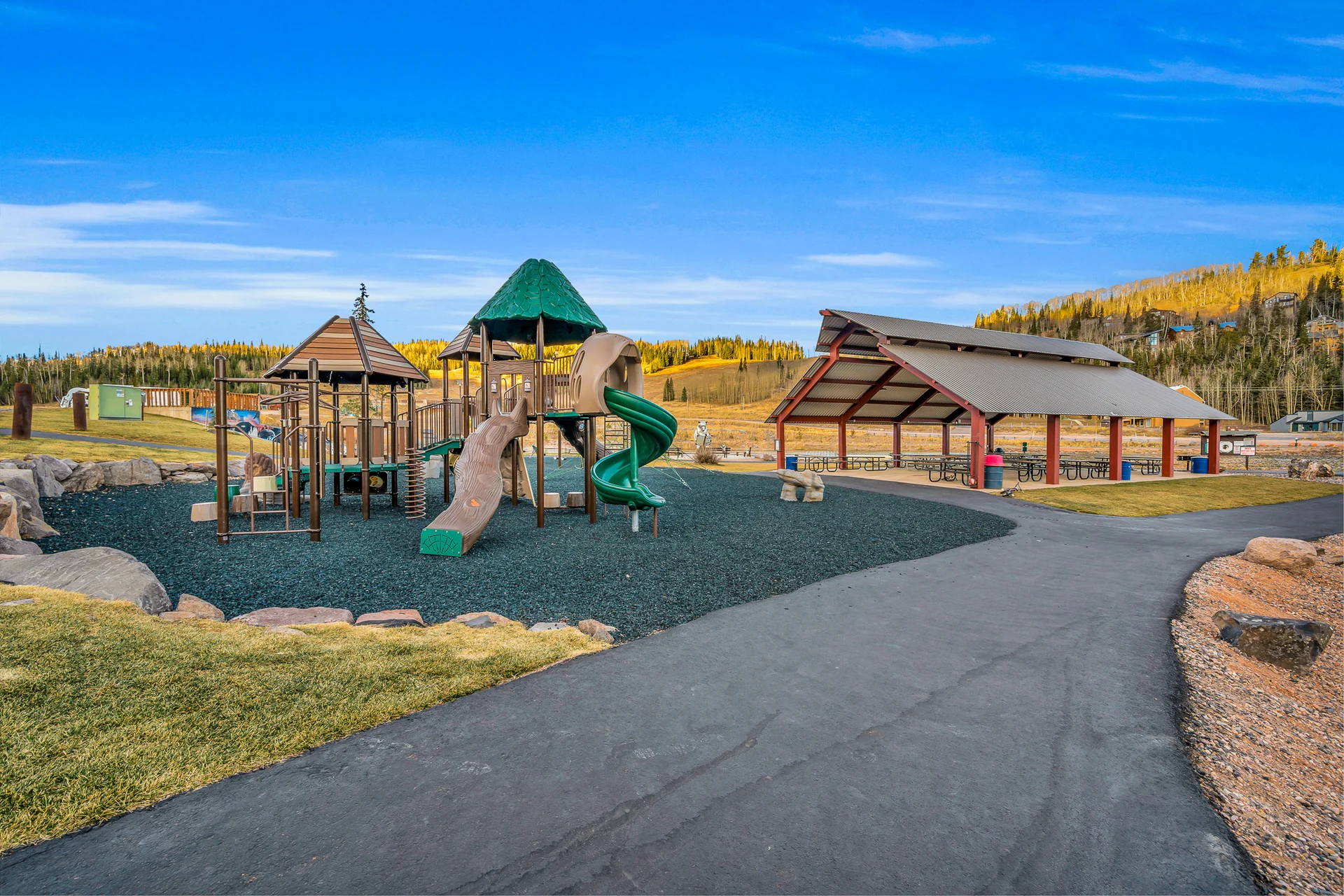 Public playground with slide and picnic pavilion in Brian Head town.