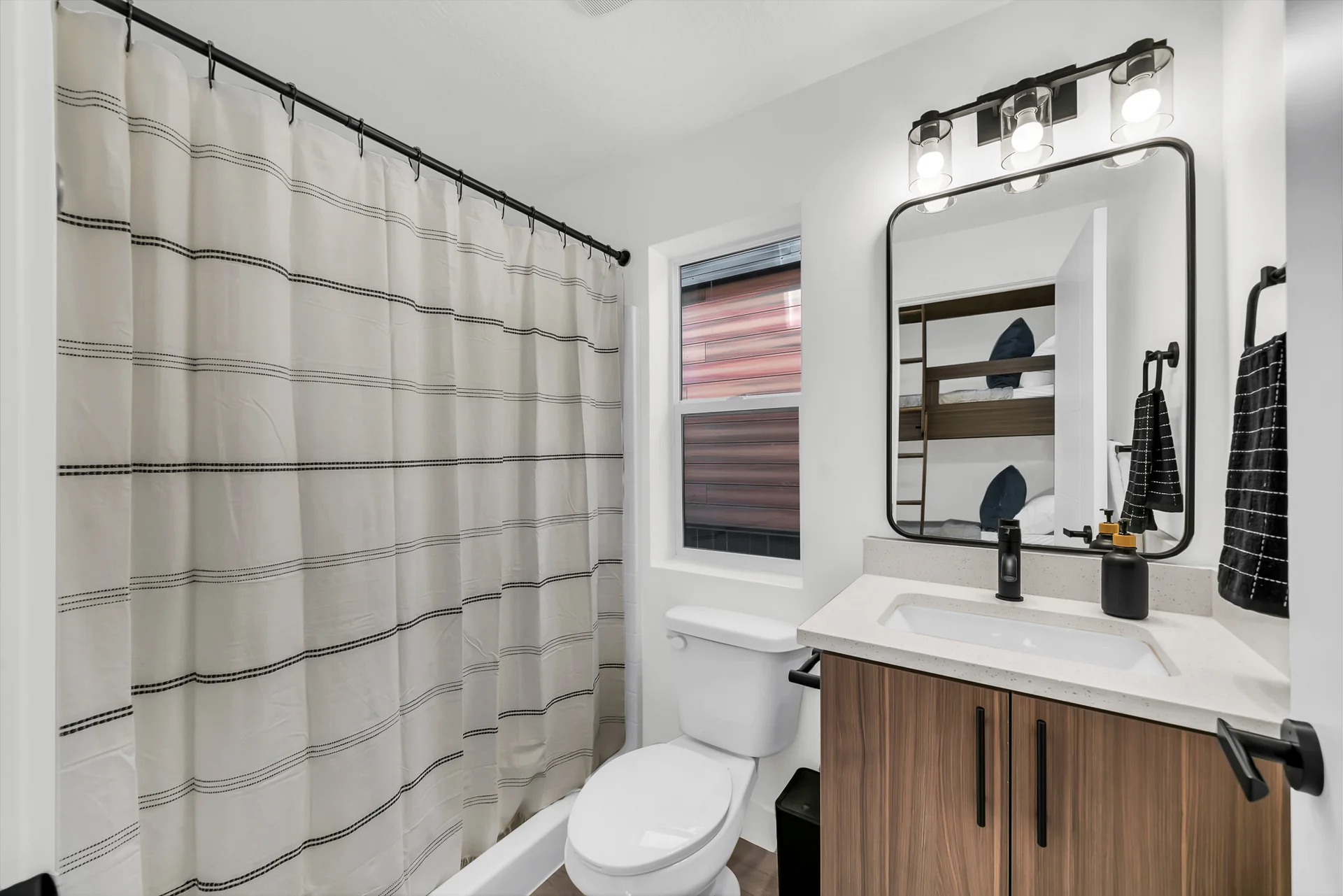 Cabin bathroom with shower and vanity