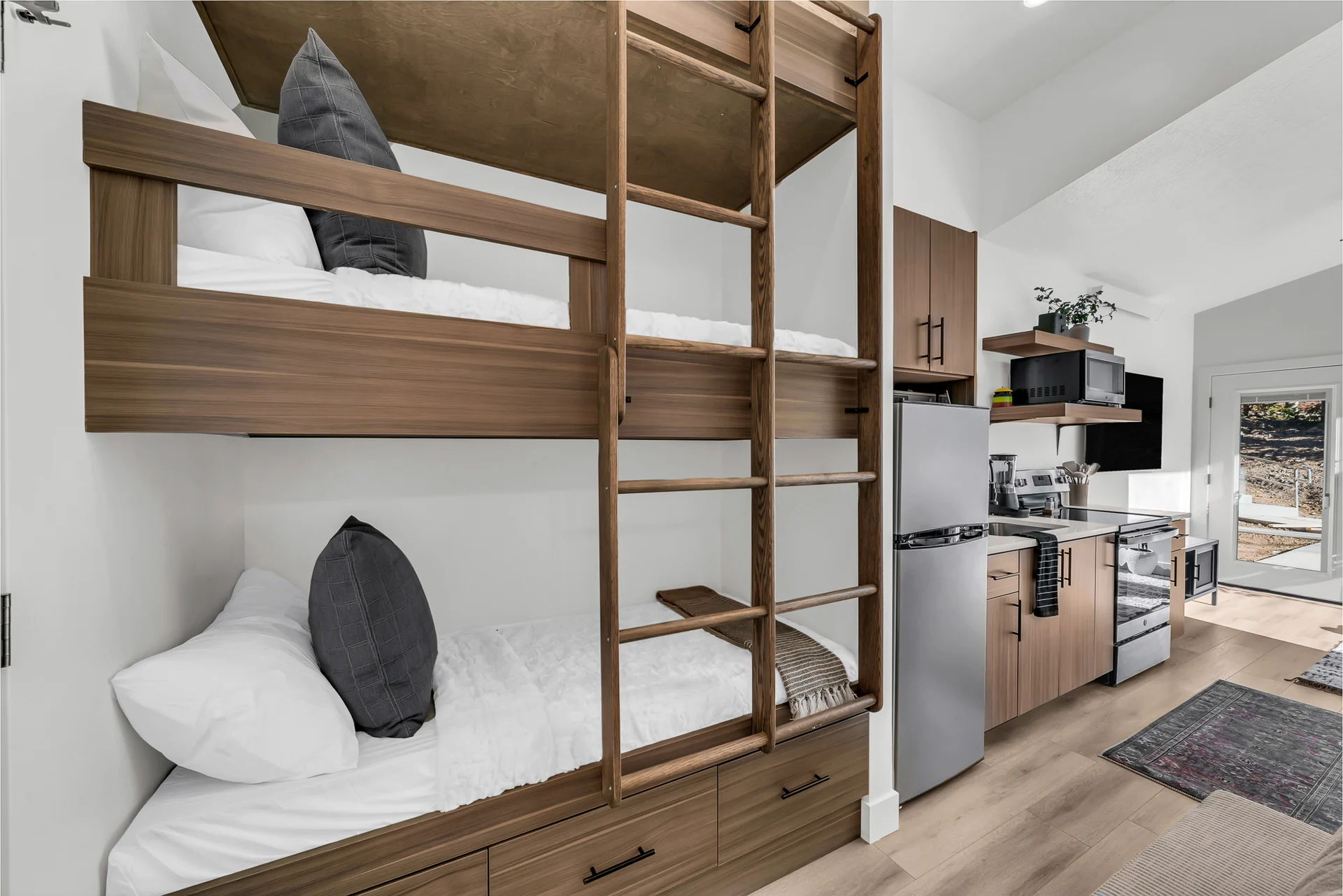 Triple twin bunks in the shared cabin layout