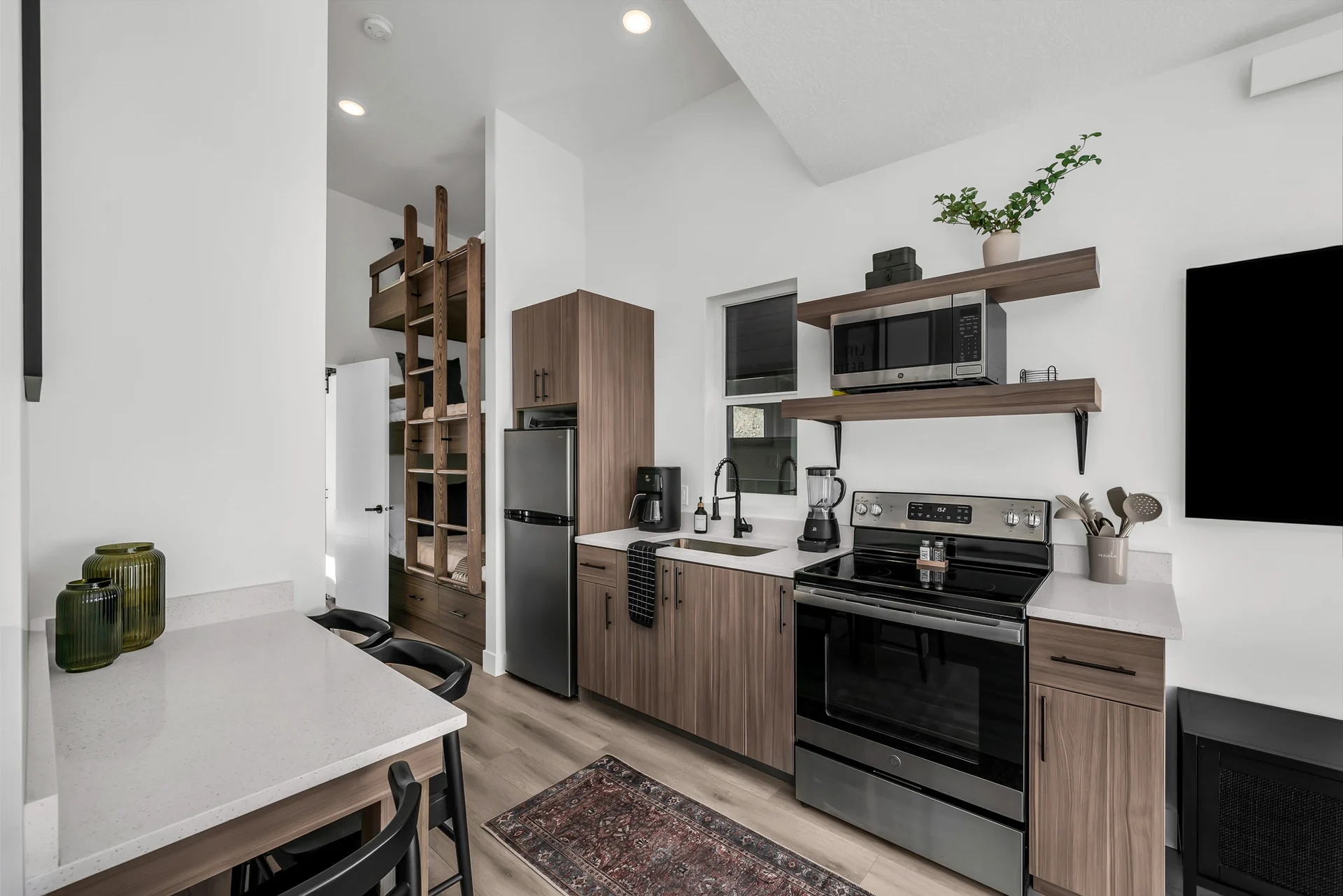 Full kitchen with refrigerator stove and oven